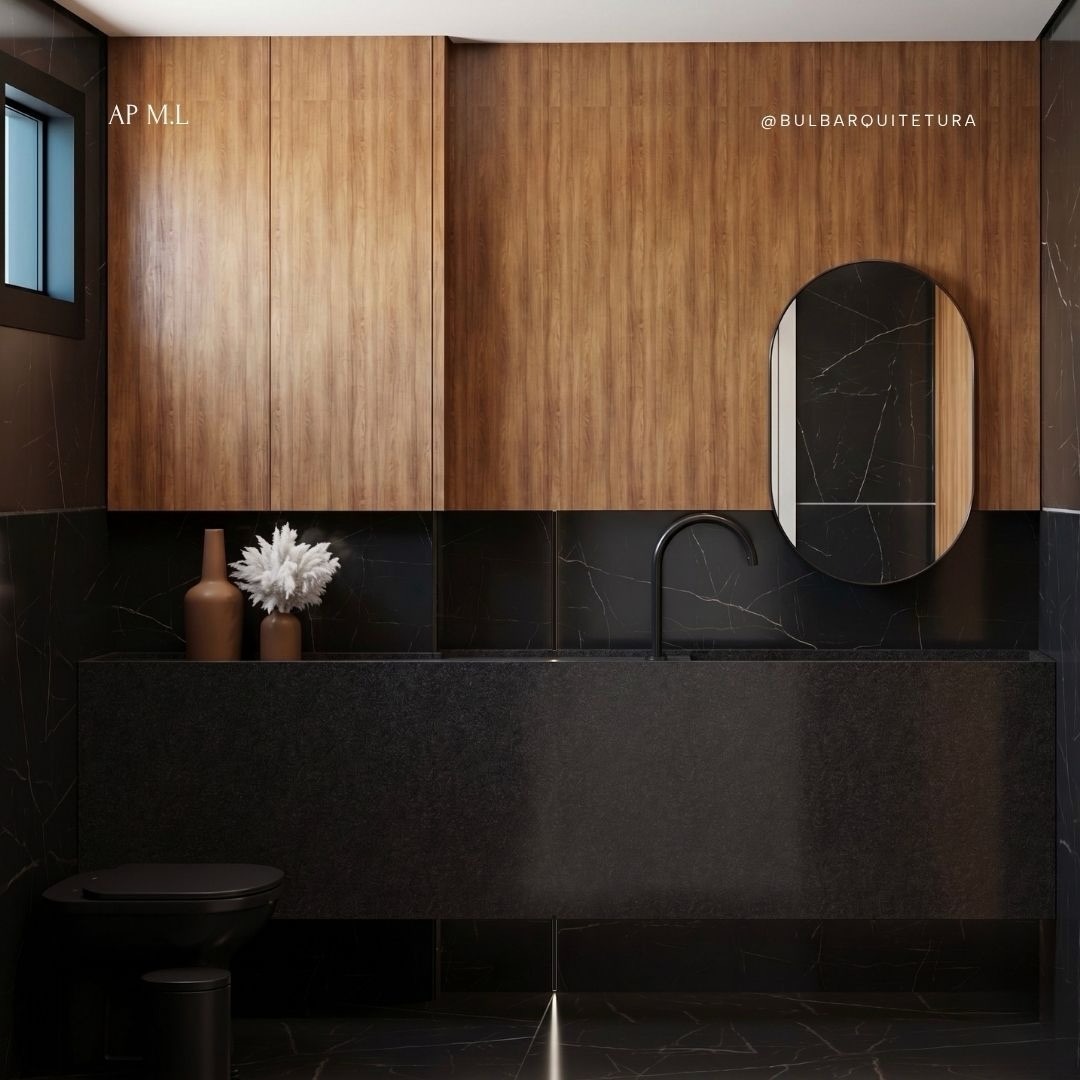 Lavabo com mármore escuro e marcenaria em madeira